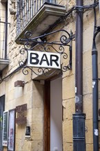 Sign for a bar above doorway entrance in village of Laguardia, Alava, Basque Country, northern