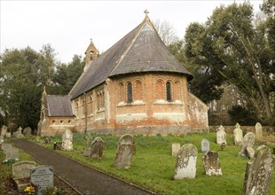 Holy Trinity Village parish church Oare, Wiltshire, England, UK built 1858 red brick Victorian