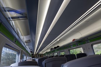 Pattern formed by stripes of ceiling lighting inside GWR InterCity Express train carriage, UK