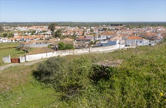 View over village Ttaditional Portuguese whitewashed cottage houses, Mourao, Alentejo Central,