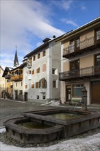 Wooden fountains, historic houses, sgraffito, facade decorations, Ardez, Engadin, Grisons,