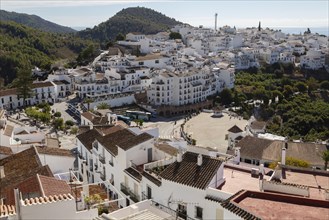 Traditional pueblo blanco whitewashed houses in village of Frigiliana, Axarquia, Andalusia, Spain,