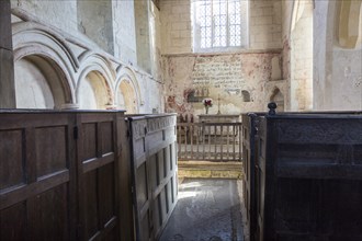 Historic interior of church of Saint John, Inglesham, Wiltshire, England, UK under the care of the