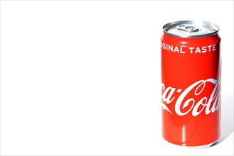 Coca-Cola can in front of a white background