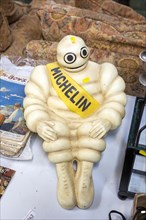 Michelin Man on display in house clearance auction sale room, UK