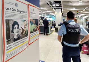 Security check with police officer at the airport, Duesseldorf, North Rhine-Westphalia, Germany,