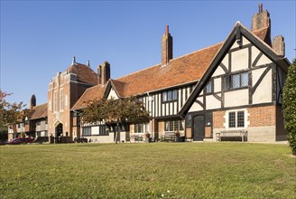 Historic almshouses building in Thorpeness, Suffolk, England, UK