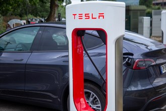 Tesla at a Supercharger in Saulce-sur-Rhone, France (09/06/2023)