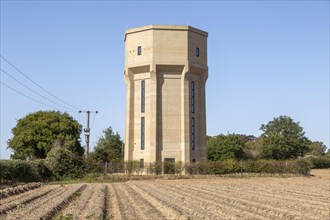 Concrete water tower converted to provide holiday home accommodation, Freston, Suffolk, England, UK