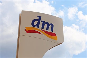 Logo of the drugstore chain DM
