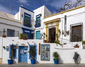 Colourful whitewashed historic buildings in town of Nijar, Almeria, Spain, Europe