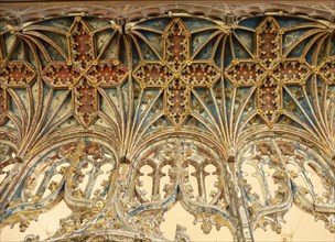 Elaborately decorated wooden rood screen in church of Saint Andrew, Bramfield, Suffolk, England, UK