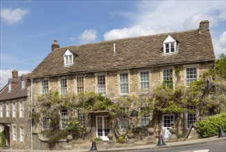 Historic stone buildings in village of Norton St Philip, Somerset, England, UK