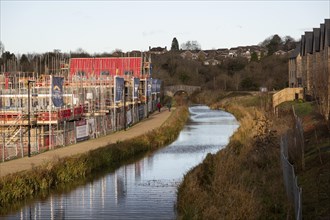 Construction work housing development along Wilts and Berks canal, Wichelstowe, Swindon, England,