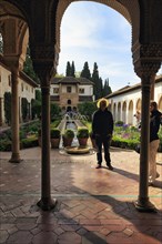 Moorish palace Generalife with green inner courtyard, tourists, Alhambra, Granada, Spain, Europe