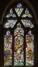 Christ and evangelists stained glass east window by Roy Coomber 1998, Hartpury church,