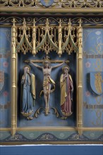 Interior of the priory church at Edington, Wiltshire, England, UK, altar reredos detail Christ on