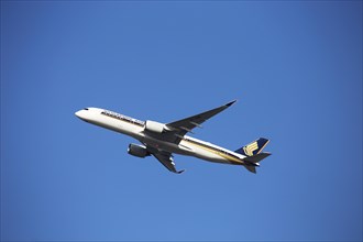 A Singapore Airlines passenger aircraft takes off from Frankfurt Airport