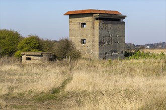 Lookout tower and pillbox military buildings, at Bawdsey, Suffolk, England, UK