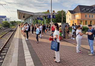 Many people waiting on the platform for the train, Luenen Central Station, North Rhine-Westphalia,