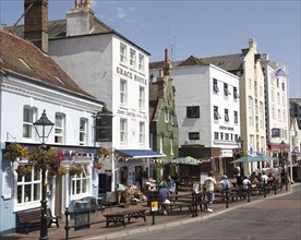 Pubs and old historic buildings on quayside at Poole harbour, Poole, Dorset, England, UK