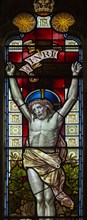 Stained glass window deytail c 1881 Crucifixion Jesus Christ on cross, Wenhaston church, Suffolk,