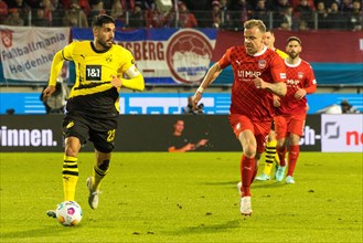 Football match, Emre CAN Borussia Dortmung on the ball in a duel with Lennard MALONEY 1.FC