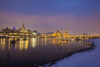 The silhouette of Dresden's Old Town with its historic buildings is reflected in the Elbe, Dresden,