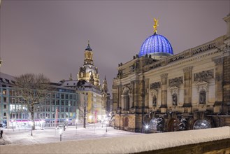 The old town of Dresden with its historic buildings. Georg Treu Platz with art society building and
