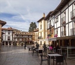 Historic buildings in town of Ezcaray, La Rioja Alta, Spain, cafe bar Ropy in Plaza Conde de