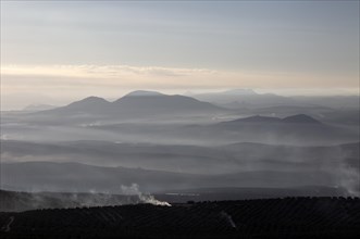 Misty morning view south over Rio Guadalquivir valley from Baeza, Jaen province, Andalusia, Spain,