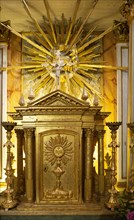 Ornately decorated altar nside the 17th century church of Igreja de Santiago, Tavira, Algarve,