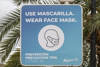 Use Mascarilla, Wear face Mask, Covid-19 precautions sign, Mojacar, Spain, Europe