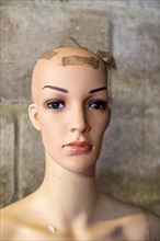 Mannequin model on display in house clearance auction sale room, UK