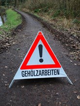 Sign with the inscription Gehoelzarbeiten, Warning, North Rhine-Westphalia, Germany, Europe