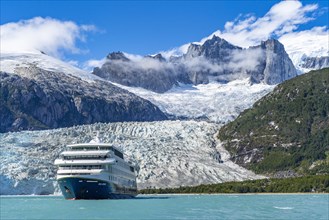 Cruise ship Stella Australis anchors in front of the Pia Glacier, Alberto de Agostini National