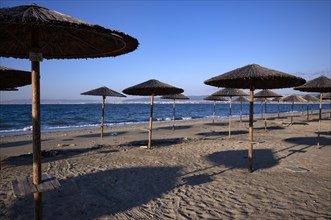 Sunshades, beach bar, empty, beach, sea, Peraia, also Perea, evening light, Thessaloniki,