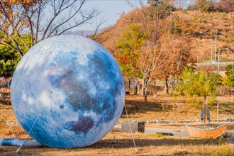 Large inflatable replica of moon in wilderness park in Pohang, South Korea, Asia