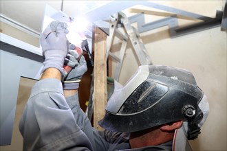 Metal worker during welding work