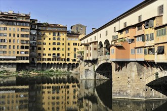 Building along the river Arno with Ponte Vecchio bridge, Florence, Tuscany, Italy, Europe