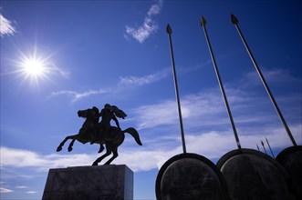Statue, monument, military leader Alexander the Great on his horse Voukefalas, shields, spears,