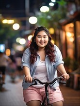 Cheerful woman on a bike enjoying a night ride in an urban setting with city lights, San Francisco,