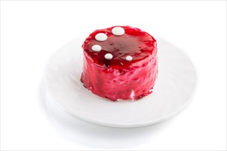 Red cake with souffle cream isolated on white background. side view, close up