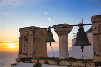 Bell tower at sunset, Oia, Santorini, Cyclades, Greece, Europe