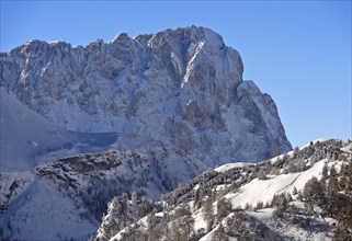 Rugged rock face of the Sassolungo massif, Sassolungo, in winter, Colfosco, Val Gardena, Dolomites,