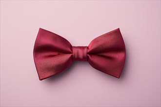 Burgundy red bow tie on pink background. KI generiert, generiert AI generated