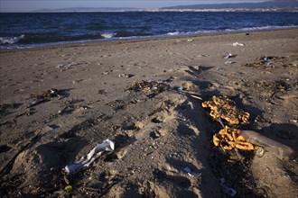 Pollution, rubbish, litter, plastic waste, beach, sandy beach, sea, Peraia, also Perea, evening