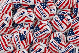 US Presidential election background with dozens of campaign buttons. 3D illustration