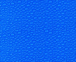Many small water drops on a blue surface