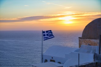 Greek flag at sunset, Santorini, Cyclades, Greece, Europe